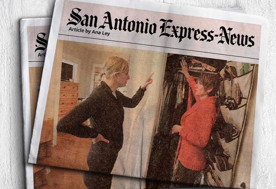 A newspaper with the front page of san antonio express-news.
